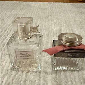 Miss Dior and Chloé empty perfume bottles